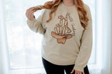 Lassoed Legends - Skeleton Hand Graphic Sweatshirt